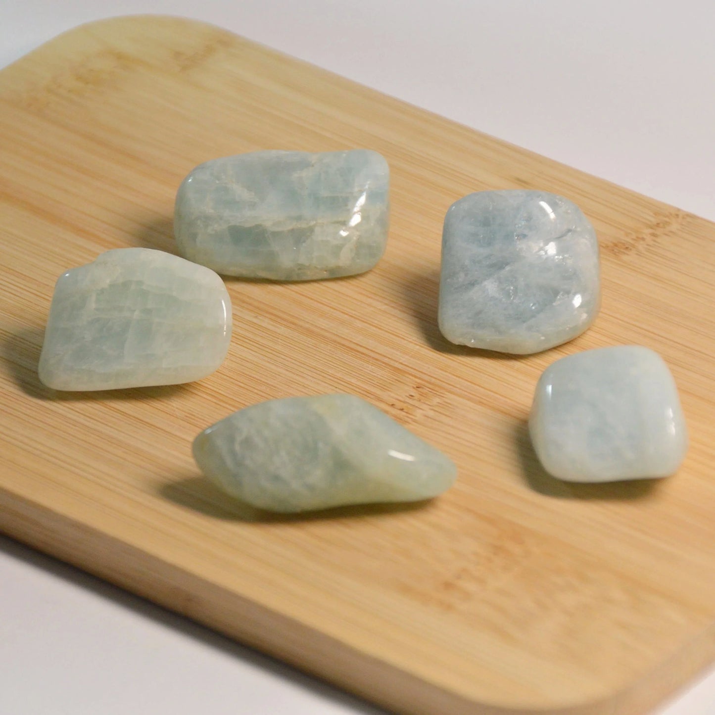 Aquamarin Trommelstein, verschiedene Varianten