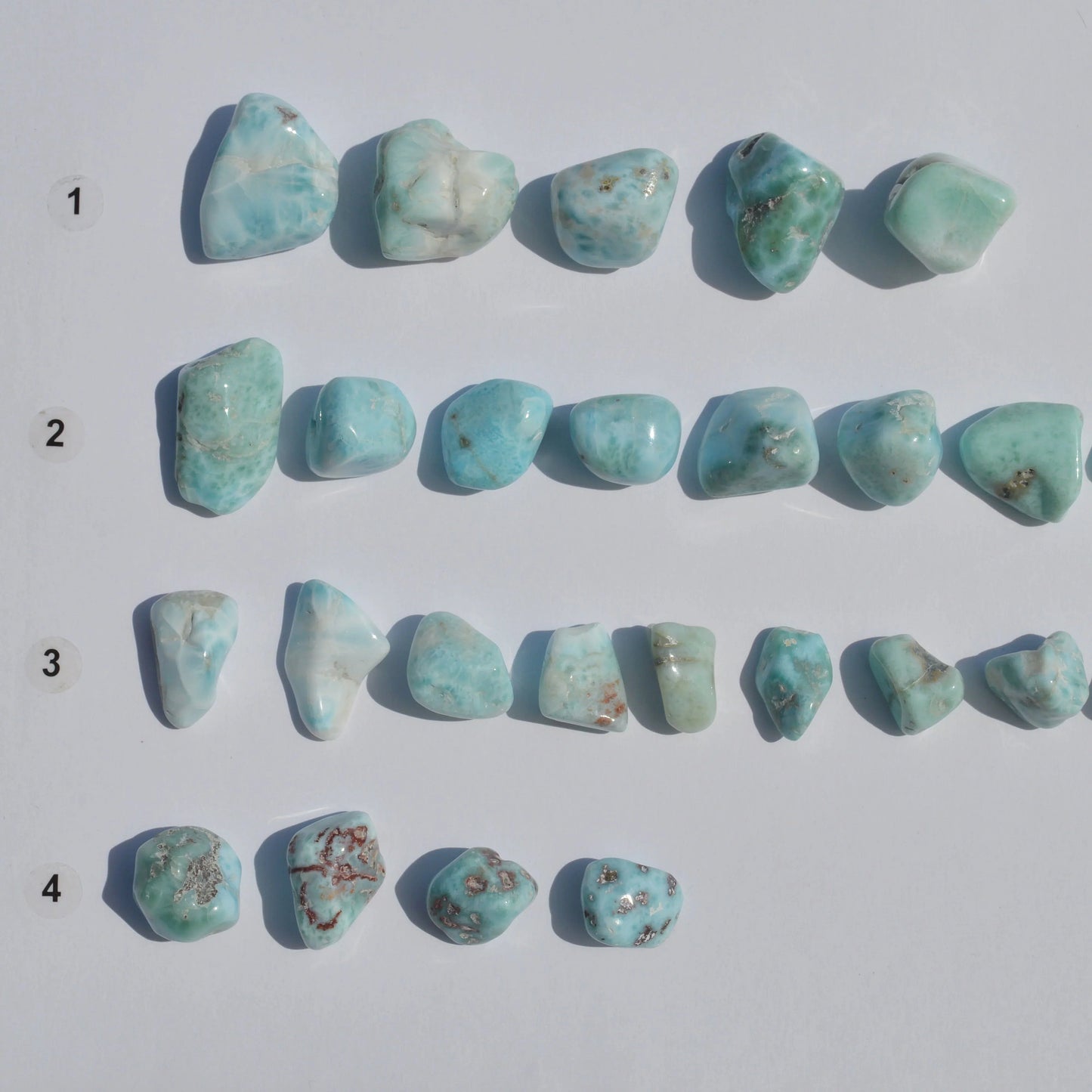 Larimar Trommelstein, verschiedene Größen