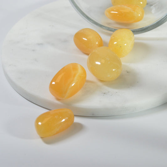 Orangen Calcit Trommelstein