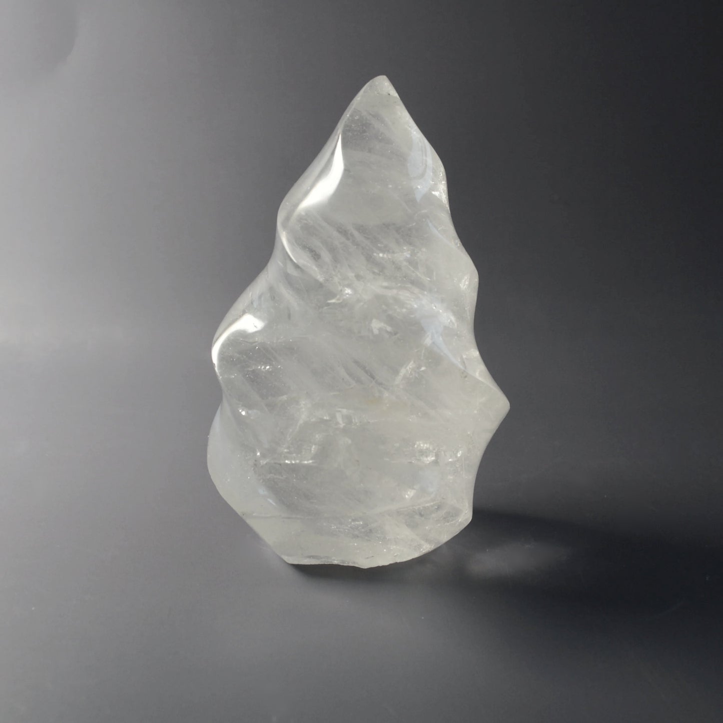 Bergkristall Flamme mit Regenbögen