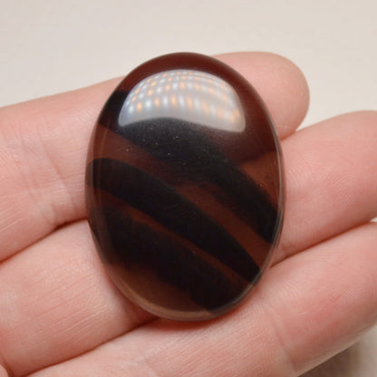 Lamellen-Obsidian Cabochon