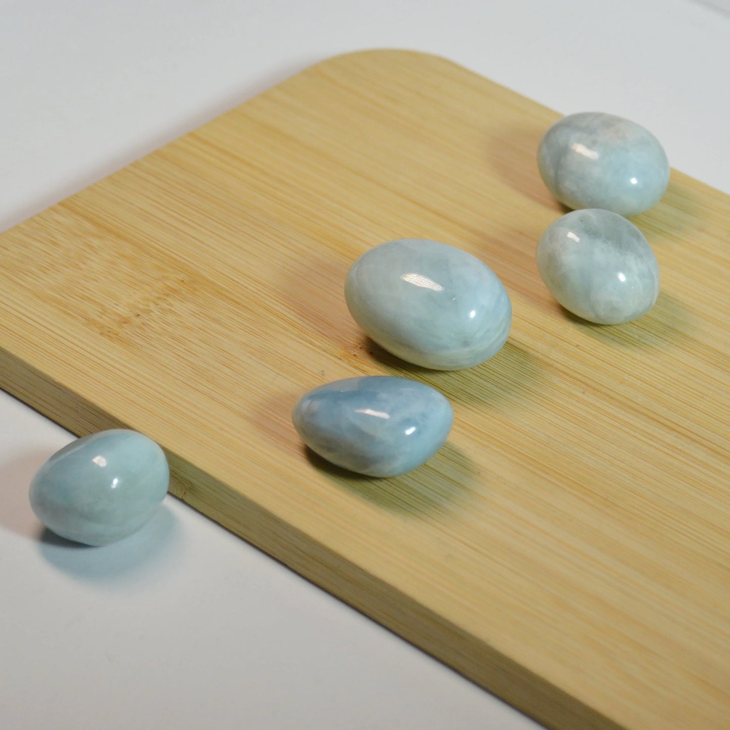 Aquamarin Trommelstein, verschiedene Varianten