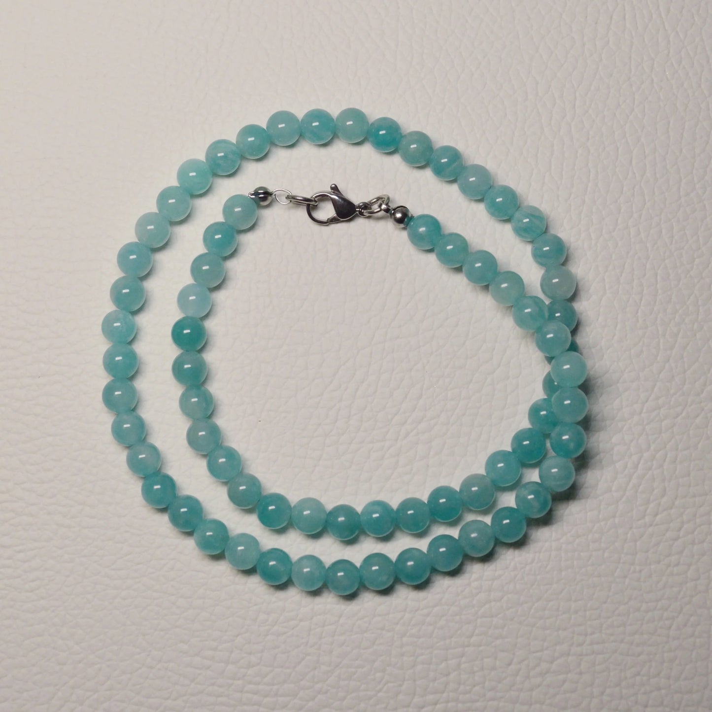 Elegante Amazonit Kette mit 6mm Kristallperlen – perfekt als Geschenk oder für den Alltag.