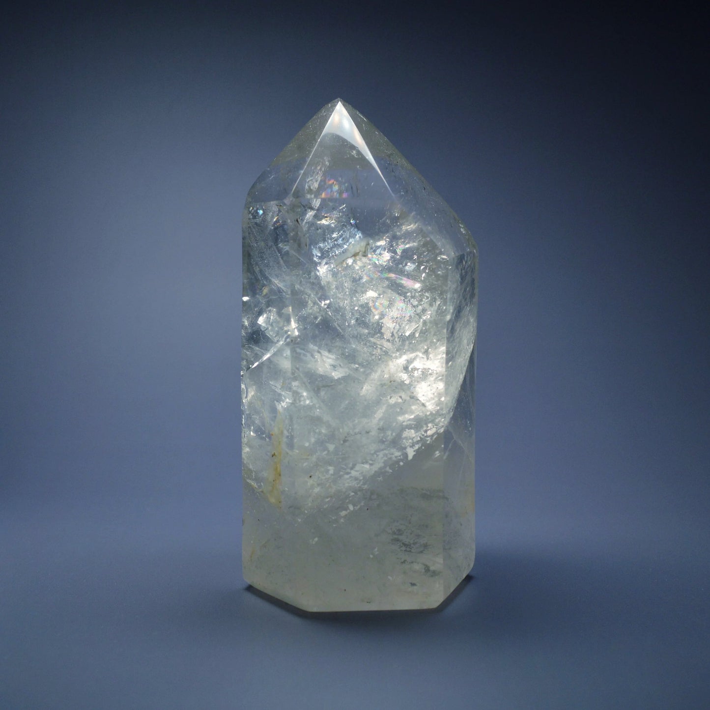 Bergkristall Spitze mit Regenbögen