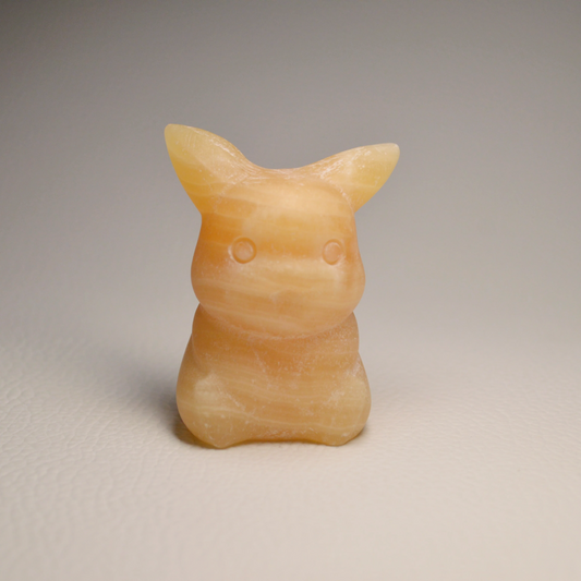 Orangen Calcit Pikachu