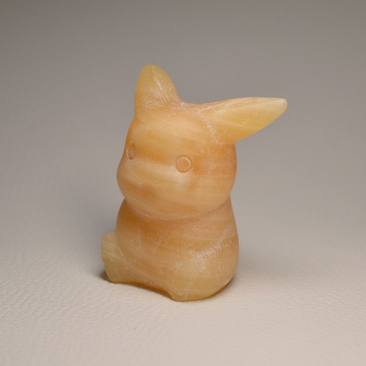 Orangen Calcit Pikachu