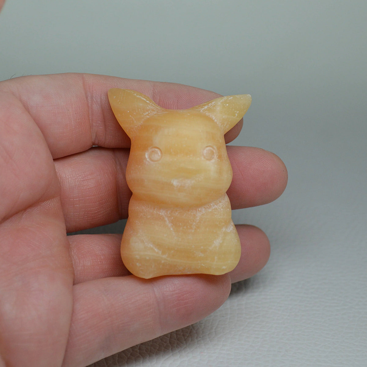 Orangen Calcit Pikachu